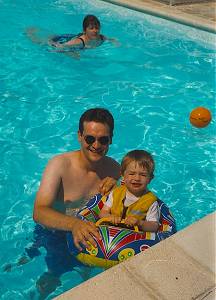 Tracey, Andrew and Max in the Pool